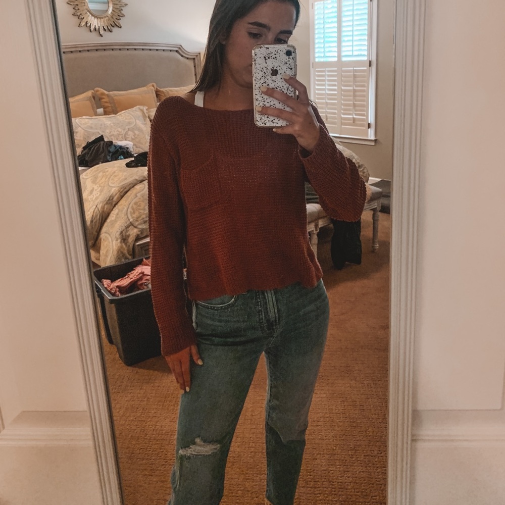 pink pocketed knit sweater
